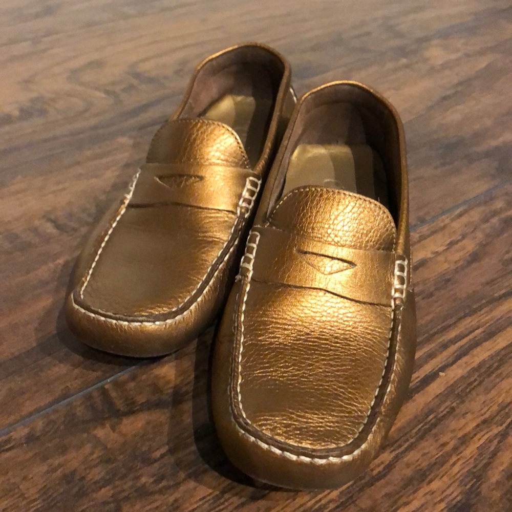 Cole Haan Gold leather loafers.